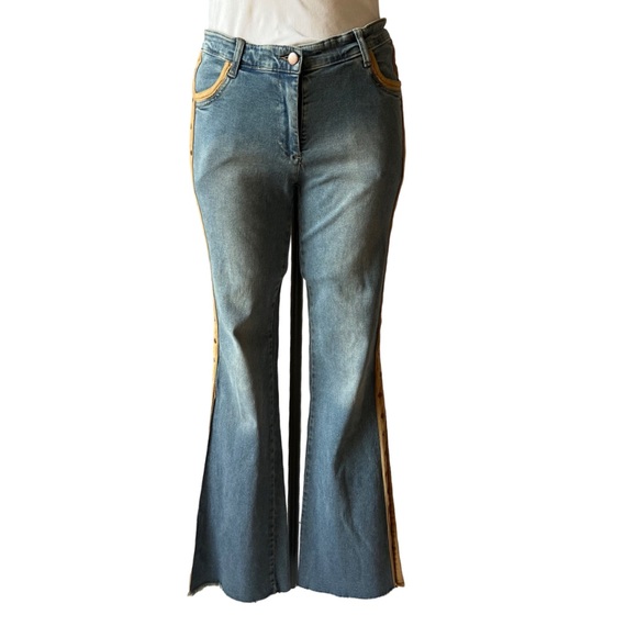 Bebe Flare Jeans with faux suede studded trim lines on the outer leg, Raw hem - Picture 2 of 11